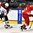 GRAND FORKS, NORTH DAKOTA - APRIL 22: Latvia's Renars Krastenbergs #17 plays the puck while Denmark's Nikolaj Krag #11 defends during relegation round action at the 2016 IIHF Ice Hockey U18 World Championship. (Photo by Matt Zambonin/HHOF-IIHF Images)
